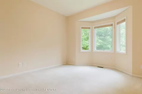 Bedroom - 5601 Wild Iris Ln, Haslett, MI 48840 photo 3 of 8