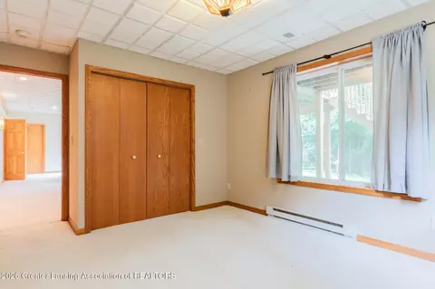 Bedroom - 5601 Wild Iris Ln, Haslett, MI 48840 photo 7 of 8