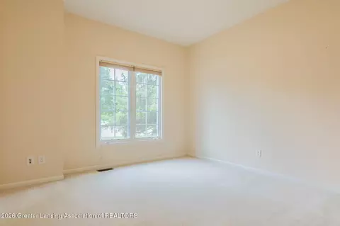 Bedroom - 5601 Wild Iris Ln, Haslett, MI 48840 photo 5 of 8