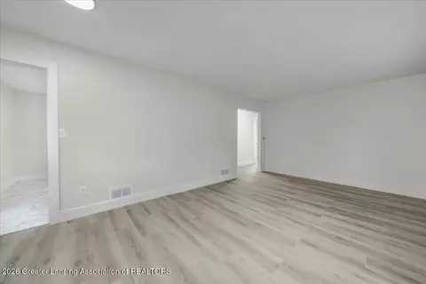 Living - 5573 Cade St, Haslett, MI 48840 photo 1 of 2