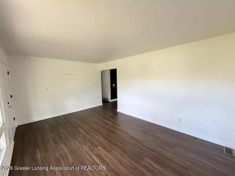 Living - 3717 Starlight Ln, Lansing, MI 48911 photo 3 of 4
