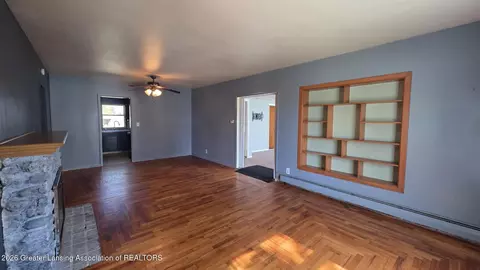 Living - 1323 E Willoughby Rd, Lansing, MI 48911 photo 3 of 5