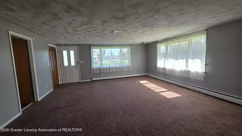 Living - 1323 E Willoughby Rd, Lansing, MI 48911 photo 2 of 5