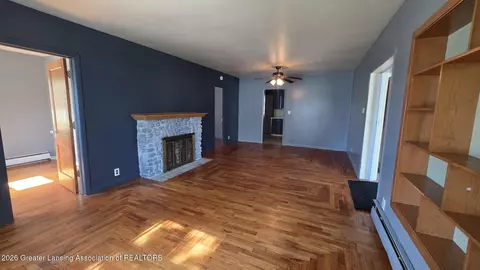 Living - 1323 E Willoughby Rd, Lansing, MI 48911 photo 4 of 5