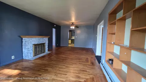 Living - 1323 E Willoughby Rd, Lansing, MI 48911 photo 6 of 12
