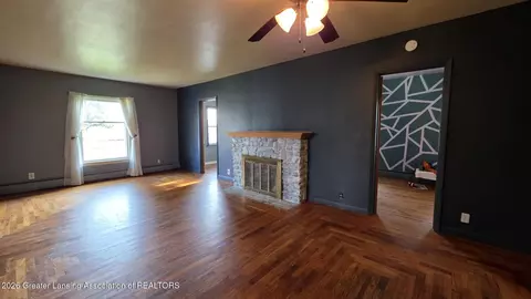 Living - 1323 E Willoughby Rd, Lansing, MI 48911 photo 11 of 12