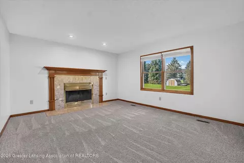 Living - 12382 Burlingame Dr, Dewitt, MI 48820 photo 3 of 5