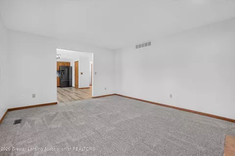 Living - 12382 Burlingame Dr, Dewitt, MI 48820 photo 5 of 5