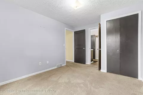 Bedroom - 6044 Bishop Rd, Lansing, MI 48911 photo 4 of 5