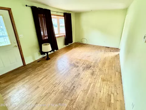 Living - 744 Walnut St, Charlotte, MI 48813 photo 2 of 3
