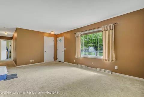 Living - 1112 Ro Dic Don Dr, Dewitt, MI 48820 photo 3 of 4