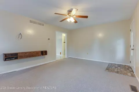Living - 4275 Keller Rd, Holt, MI 48842 photo 2 of 4