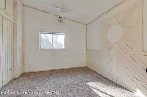 Bedroom - 6945 Delta River Dr, Lansing, MI 48906 photo 2 of 3