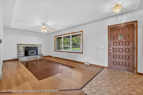 Living - 15157 Pinehurst Dr, Lansing, MI 48906 photo 1 of 4