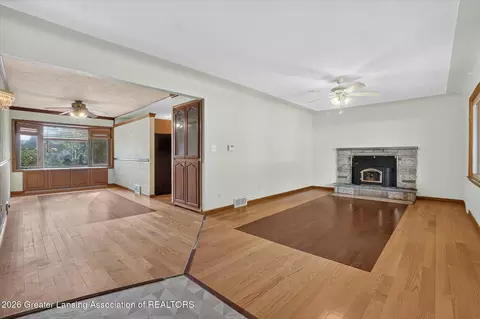 Living - 15157 Pinehurst Dr, Lansing, MI 48906 photo 2 of 4
