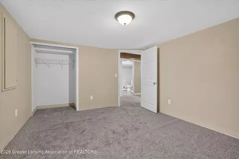 Bedroom - 15157 Pinehurst Dr, Lansing, MI 48906 photo 9 of 11