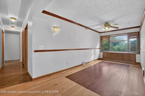 Living - 15157 Pinehurst Dr, Lansing, MI 48906 photo 4 of 4