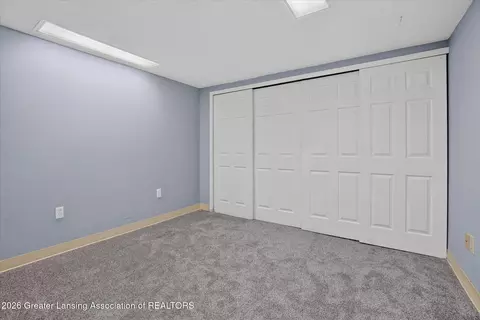 Bedroom - 15157 Pinehurst Dr, Lansing, MI 48906 photo 10 of 11