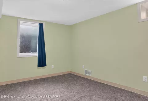 Bedroom - 15157 Pinehurst Dr, Lansing, MI 48906 photo 6 of 11