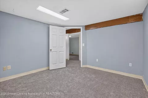 Bedroom - 15157 Pinehurst Dr, Lansing, MI 48906 photo 11 of 11
