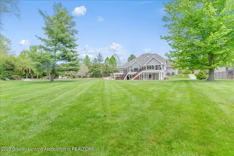 Exterior - 410 W Spring Meadows Ln, Dewitt, MI 48820 photo 8 of 15