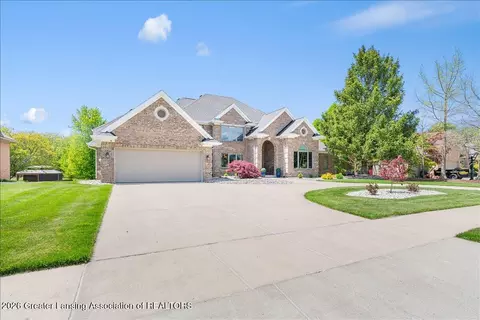 Exterior - 410 W Spring Meadows Ln, Dewitt, MI 48820 photo 3 of 15