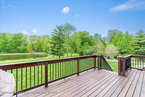 Exterior - 410 W Spring Meadows Ln, Dewitt, MI 48820 photo 12 of 15