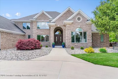 Exterior - 410 W Spring Meadows Ln, Dewitt, MI 48820 photo 4 of 15