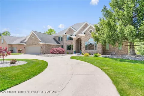 Exterior - 410 W Spring Meadows Ln, Dewitt, MI 48820 photo 2 of 15