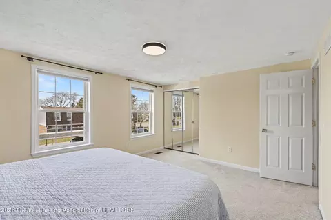 Bedroom - 6331 Beechfield Dr # 42, Lansing, MI 48911 photo 2 of 5