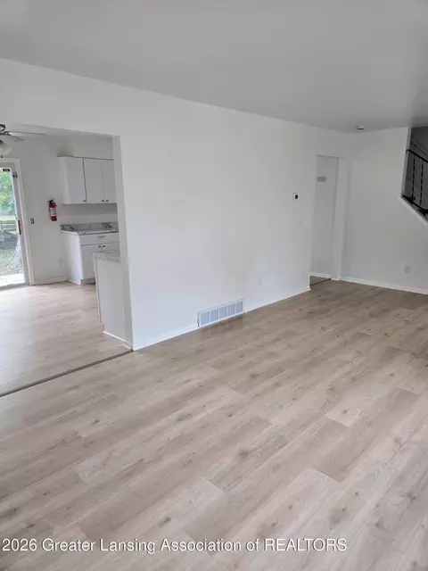 Living - 3811 Cooley Dr, Lansing, MI 48911 photo 1 of 2