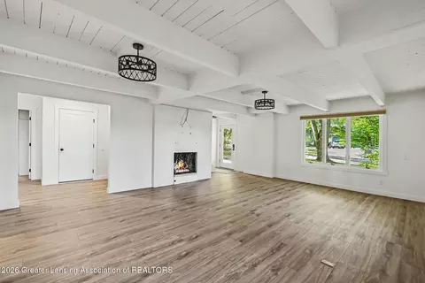 Living - 1035 E Geneva Dr, Dewitt, MI 48820 photo 3 of 6