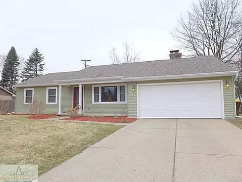 1102 Woodside, Haslett, MI 48840 photo 1