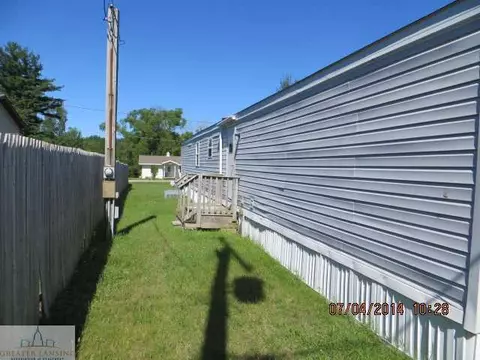 3035 Oak Dr, Stanton, MI 48888 photo 2