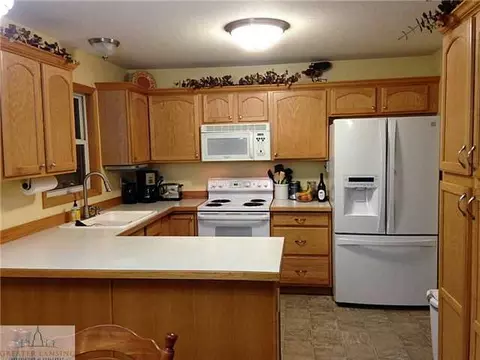 2115 Cedar Bend Dr, Holt, MI 48842 photo 4