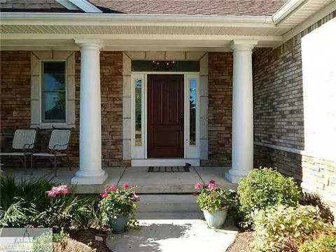 4740 Hawk Holw, Bath, MI 48808 photo 3