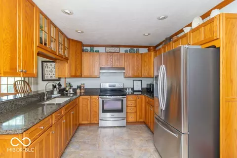 Kitchen - 406 W Cherry St, Dunreith, IN 47385 photo 2 of 3