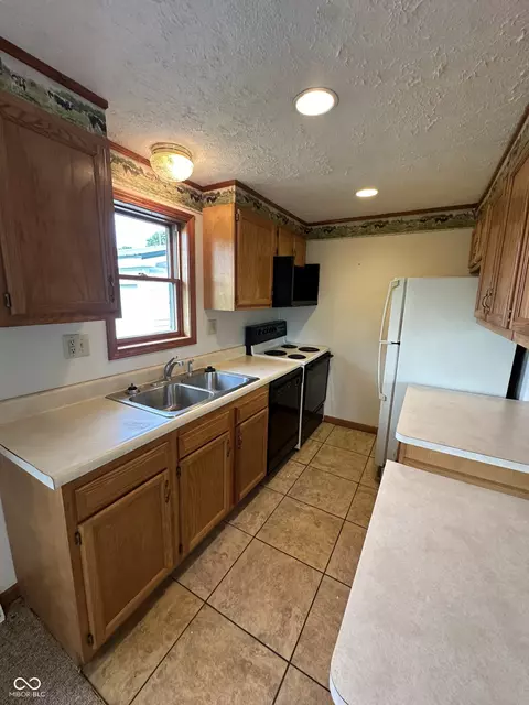 Kitchen - 107 E Oak St, Roachdale, IN 46172 photo 7 of 10