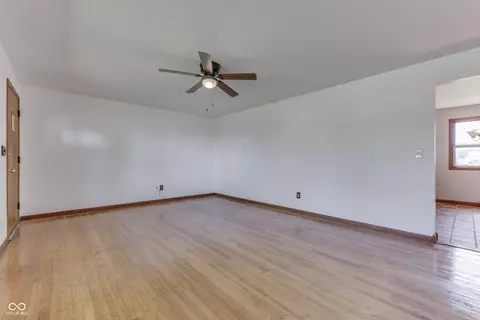 Living - 6341 Apache Dr, Indianapolis, IN 46254 photo 4 of 7
