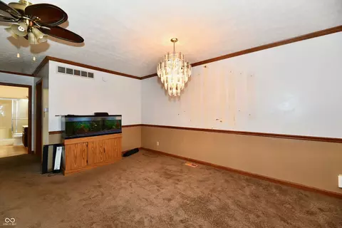 Living - 6137 Apache Dr, Indianapolis, IN 46254 photo 6 of 9