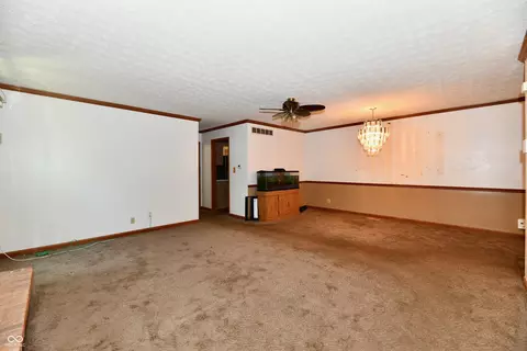 Living - 6137 Apache Dr, Indianapolis, IN 46254 photo 4 of 9