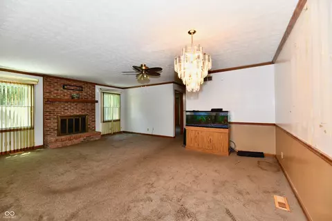Living - 6137 Apache Dr, Indianapolis, IN 46254 photo 7 of 9