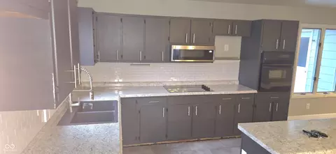 Kitchen - 10671 E State Road 7, Columbus, IN 47203 photo 1 of 2