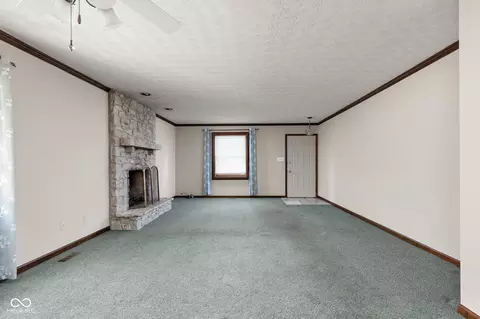 Living - 6009 Apache Dr, Indianapolis, IN 46254 photo 4 of 5