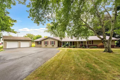 Exterior - 413 E Pickwick Dr, Syracuse, IN 46567 photo 1 of 10