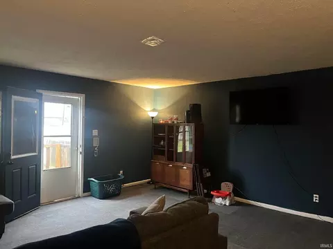 Living - 907 Walnut St, Oolitic, IN 47451 photo 2 of 2