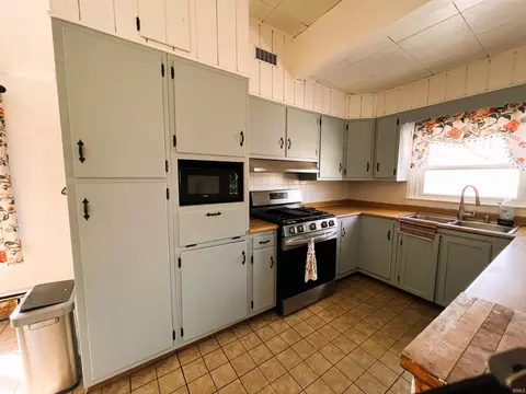 Kitchen - 501 E 4th St, Brookston, IN 47923 photo 1 of 3