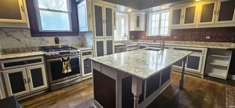 Kitchen - 126 E 4th St, Mount Carmel, IL 62863 photo 2 of 3