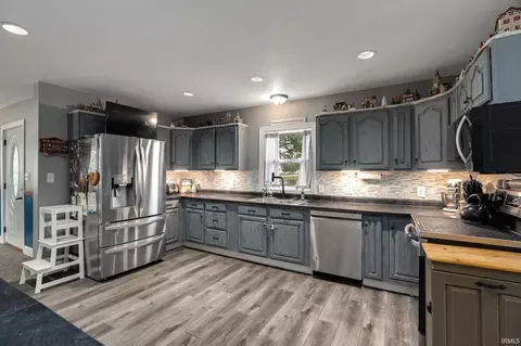 Kitchen - 702 E Walnut St, Chalmers, IN 47929 photo 2 of 2