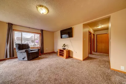 Living - 331 Walnut St, Butler, IN 46721 photo 2 of 2